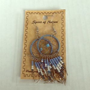 Handcrafted dangle earrings with beading